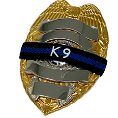 Badgeart K9 weMourning Bands reversable thin blue line on badgeart badgess / Thin Orange Line Mourning Bands with a thin orange line mourning band 1/2". Band reverses to an all-black mourning band. Public safety officers are wearing thin orange line badge shrouds to raise awareness of gun violence in the community and among police officers, firefighters, Emergency Medical Services and others. Join us in the champagne to Stop Gun Violence. Badges not included.