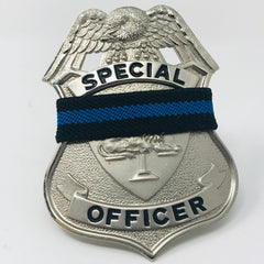 Special Police Officer with thin blue line mourning band Lion on scale