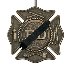 New Product Black silicone mourning band 0.2 inches wide fits badges 1.2 to 2.25 inches offered by badgeart. Band shown on a Maltese firefighters badge against size graph.
