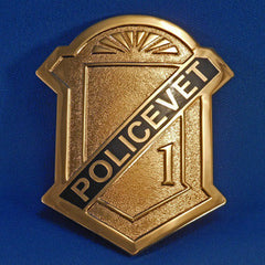 Policevet_badge_gold_with_blue