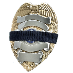 Black 1/2 inch mourning band for metal polce, fire, ems and other badges by Badgeart on gold and silver badge offered by mourningbands.org