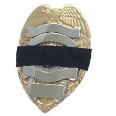 Black 3/4 inch mourning band for metal polce, fire, ems and other badges by Badgeart on gold and silver badge offered by mourningbands.org