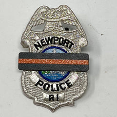 The Stop Gun Violence Wear Orange Awareness / Thin Orange Line Mourning Bars for Cloth Badges and insignia.  Black vinyl with a thin orange line mourning bar with a pair of 1/2" pins with military clasps.  Public safety officers are wearing thin orange line badge shrouds to raise awareness of gun violence in the community and among police officers, firefighters, Emergency Medical Services and others.  J
