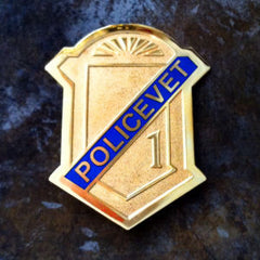 Policevet_badge_gold_with_blue