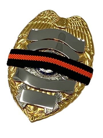 he Stop Gun Violence Wear Orange Awareness / Thin Orange Line Mourning Bands with a thin orange line mourning band 1/2". Band reverses to an all-black mourning band. Public safety officers are wearing thin orange line badge shrouds to raise awareness of gun violence in the community and among police officers, firefighters, Emergency Medical Services and others. Join us in the champagne to Stop Gun Violence. Badges not included.