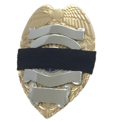 Black 3/4 inch mourning band for metal polce, fire, ems and other badges by Badgeart on gold and silver badge offered by mourningbands.org