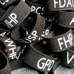 Badgeart personalized Custom Printed mourning bands with a variety of agency initials offered by badgeart custom mourning bands for police officers, firefighters and others.