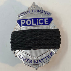 Black 1/2 inch mourning band for metal polce, fire, ems and other badges by Badgeart on gold and silver badge offered by mourningbands.org