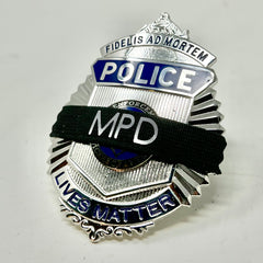 badgeart custom lettering on a black 1/2" mourning band shown on a police lives matter badge