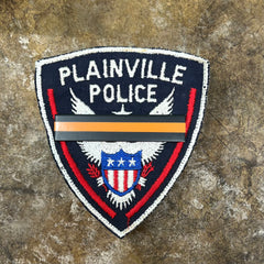 top Gun Violence Wear Orange Awareness / Mourning Bar for covering law enforcement, firefighter, EMS, agents, officers and other uniform patches and badges. 3" x 5/8" Wear Orange for Stop Gun Violence Awareness J288-SGV Black/Orange/Black Metal Mourning Bar with Orange Band that has 2 F9 nails (5/16" long) with clutch back attachments. Best worn over a badge patch that is on a shirt. 